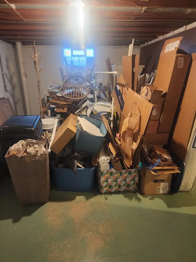 Roll-off dumpster container at job site for Roll Off Dumpster Rental in Weddington